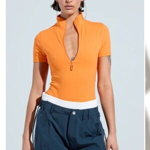 AKIRA Orange Zip-Up Bodysuit